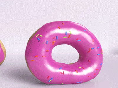 a 3D animation of donuts rolling across the screen